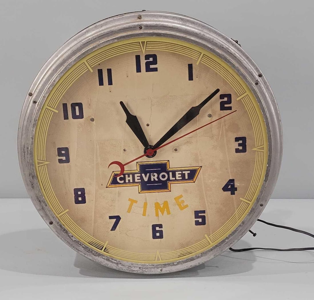 Chevrolet "Time" Neon Clock: rated 6. Clock isn't in working order. The neon is missing and face is yellowed and dirty.