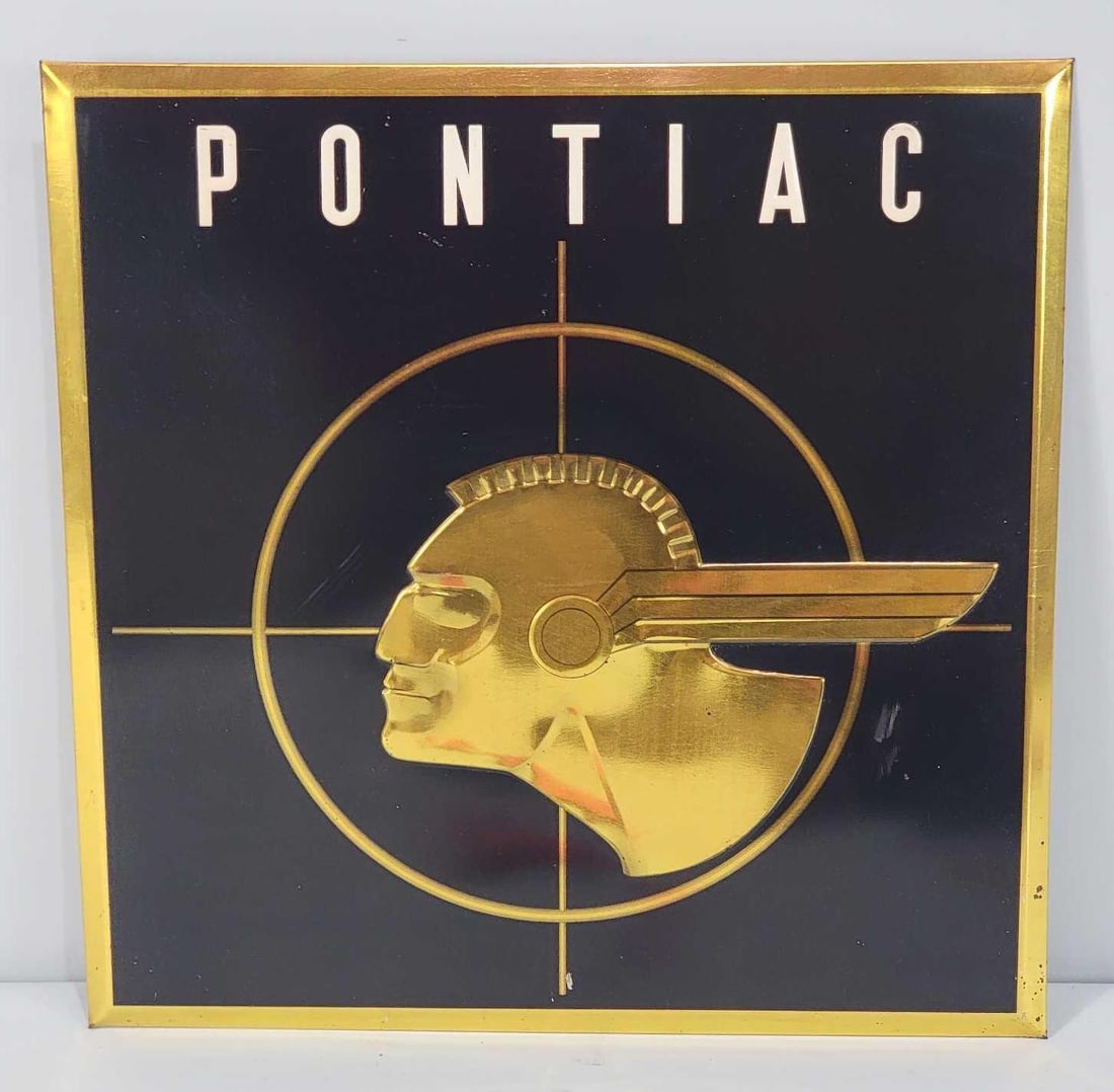 Pontiac w/Art Deco Style Logo w/Full Feather Metal Sign (TAC): rated 9, 15.75"x15.75". The SST embossed tin over cardboard sign has excellent color and shine with only light surface wear. Rarity 4. TAC #061140