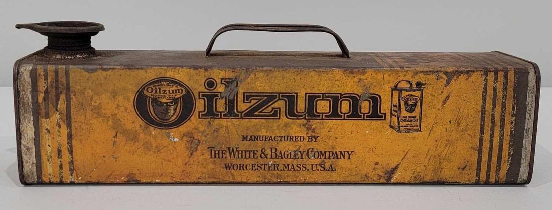 Oilzum Under-The-Seat Metal One-Gallon Can w/Logo: rated 6.9. This one-gallon under-the-seat can has wear and soiling. Can is missing it's lid and is empty.