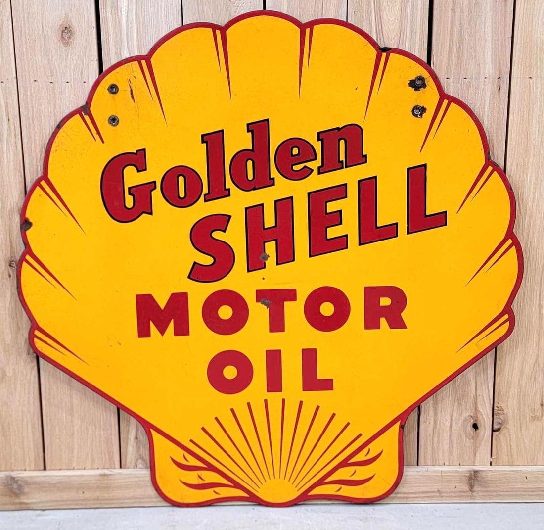 Golden Shell Motor Oil Porcelain Sign (TAC): rated 8+, 36"x36". This DSP die-cut sign has excellent color and gloss. Sign has chips and light wear in the field, as well as, a minor crease at the top. Sign has chips at the mounting holes. Rarity
