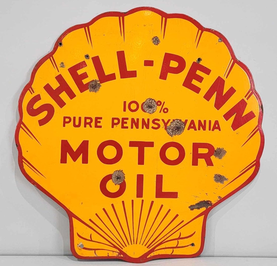 Shell-Penn Motor Oil 100% Pure Pennsylvania Porcelain Sign (TAC): rated 7.9, 30"x29.5", the SSP diecut sign has good color and gloss with several bullet hits in the field. Sign was used on the end of an oil bottle rack. Rarity 6. TAC #060983