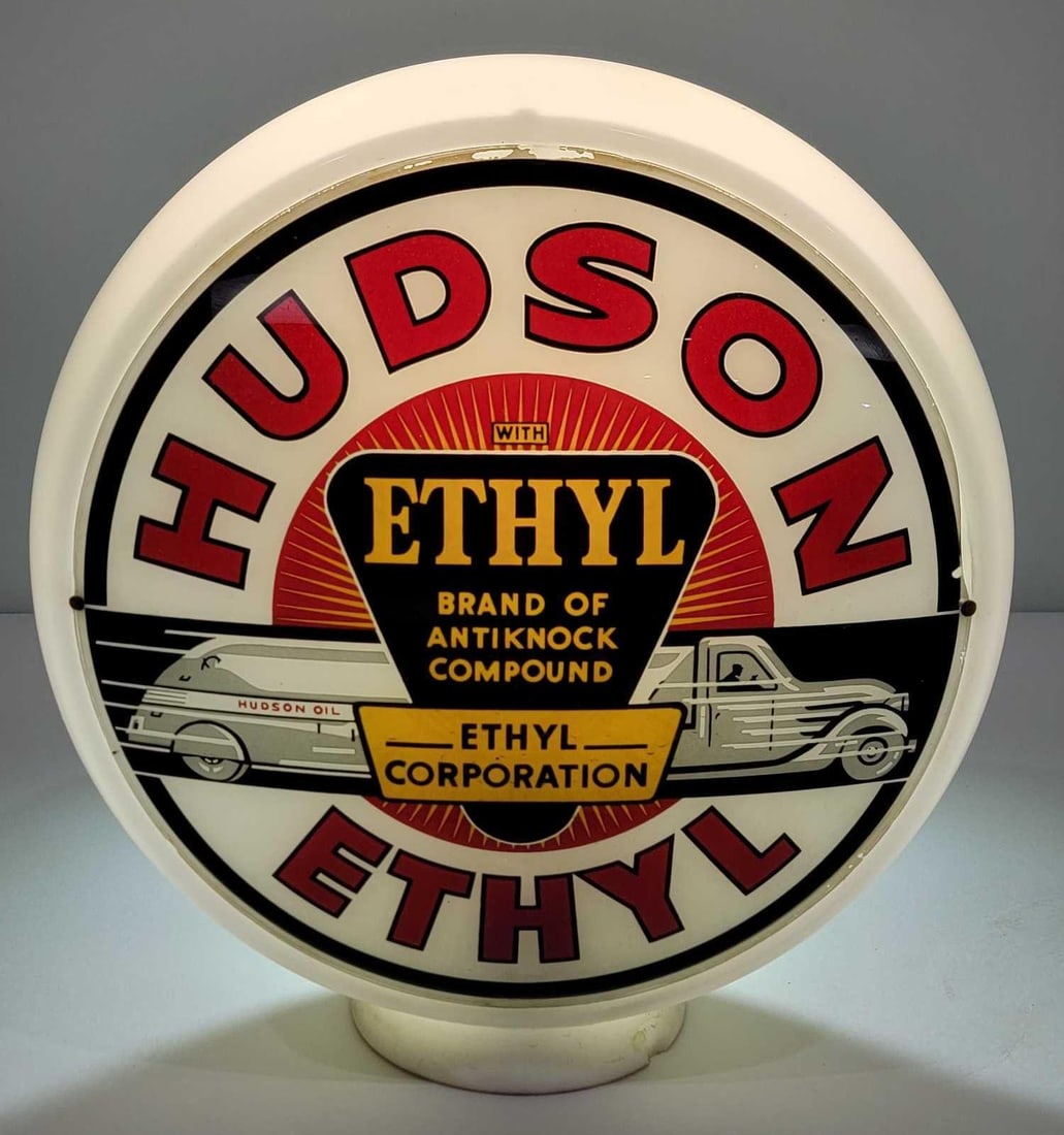 Hudson Ethyl w/Truck Image 13.5" Globe Single Lens (TAC): rated 8.5, 13.5"D., the single globe lens has very good color, field is clean, has small piece of glass missing at 3 o'clock, mounted on a wide glass globe body, has a few base chips. TAC #025579