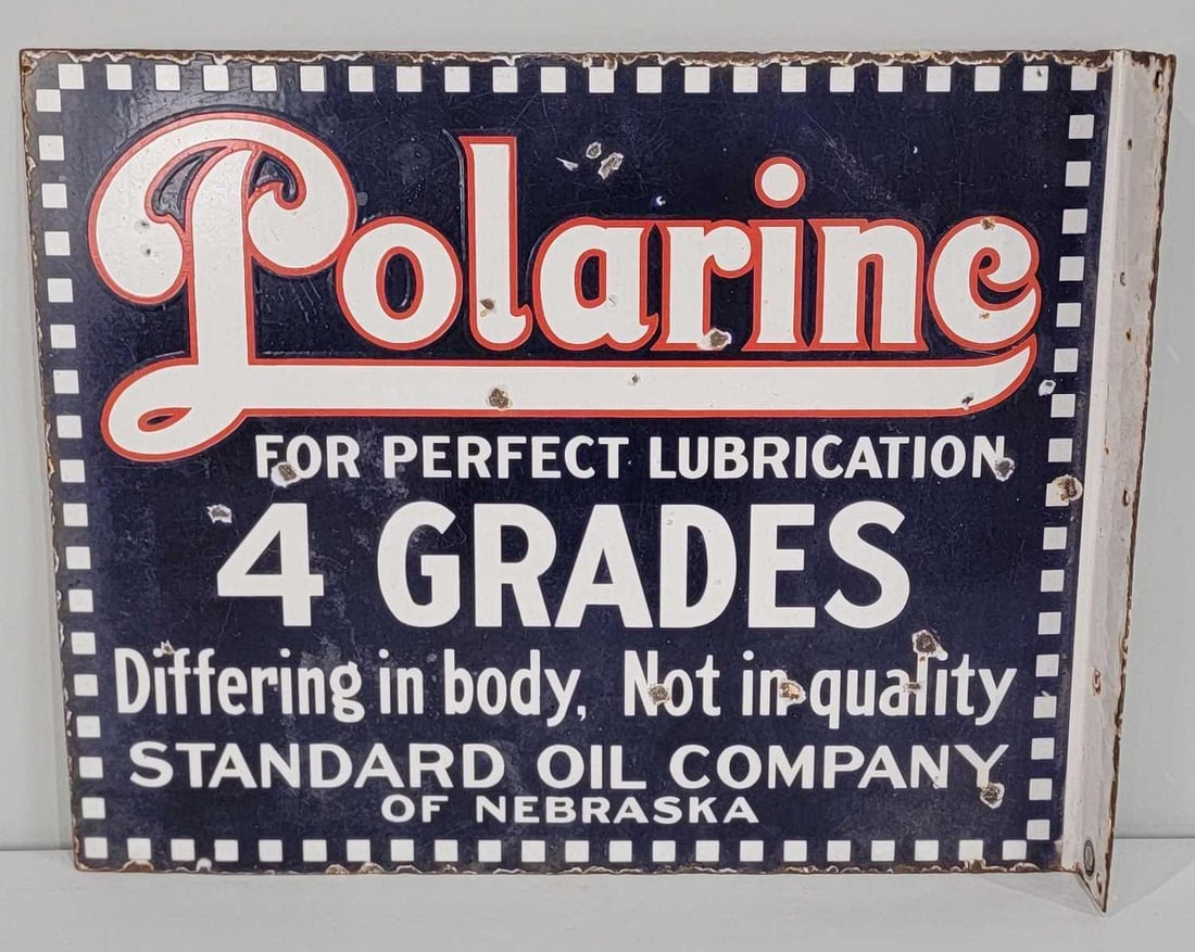 Rare Standard Oil Co. Nebraska Polarine 4-Grades Porcelain Sign (TAC): rated 7.5, 17.75"x22", the single-sided flange sign has some gloss, the blue is slightly milky. Sign has chip and wear around the perimeter. Rarity 9. TAC #060955
