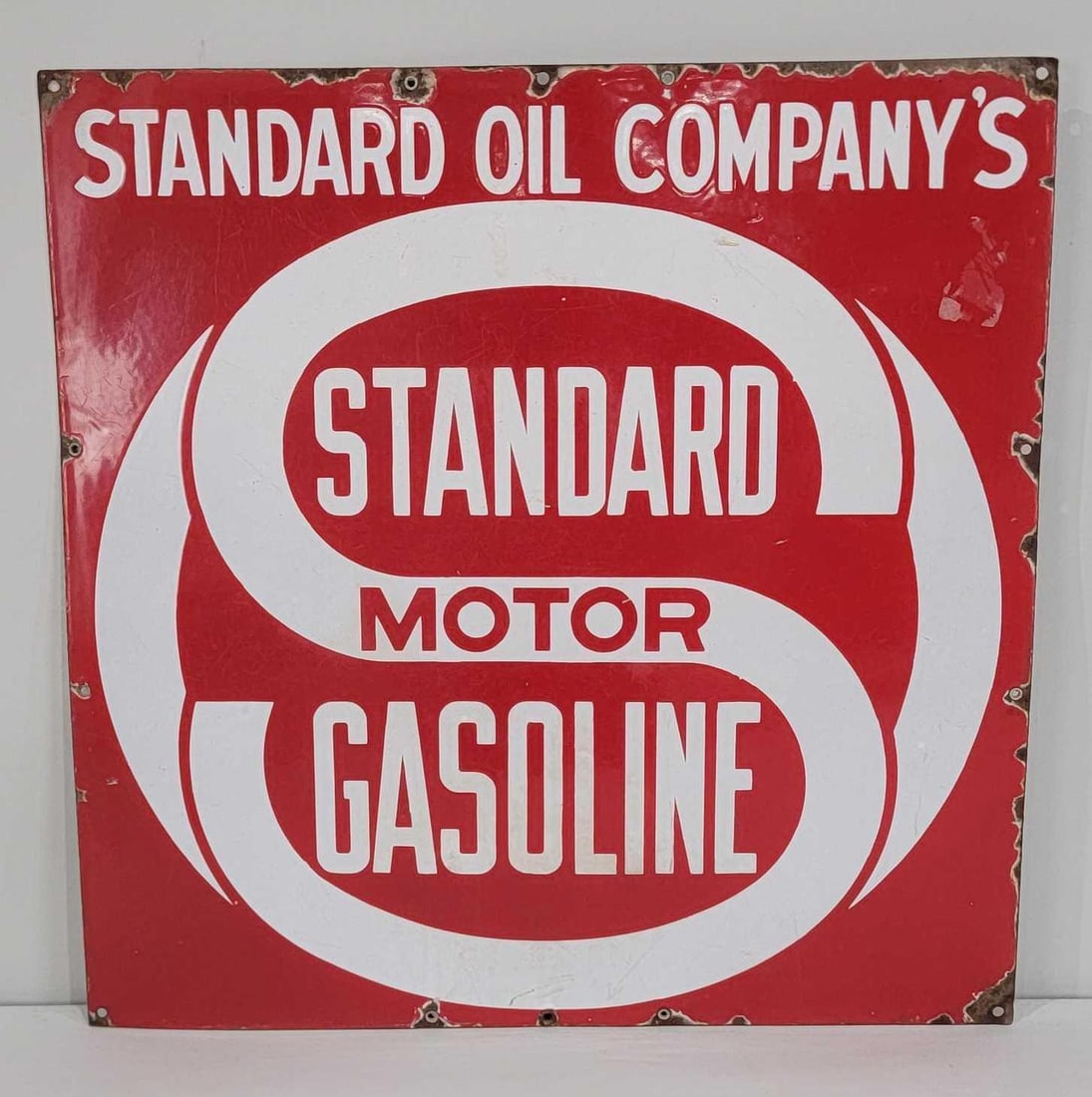 Standard Motor Gasoline w/Logo Porcelain Sign (TAC): rated 8, 24"x24", the SSP sign has good color and gloss, has wear and fine scratches. Sogn has chips around the perimeter. Rarity 6. TAC #06095