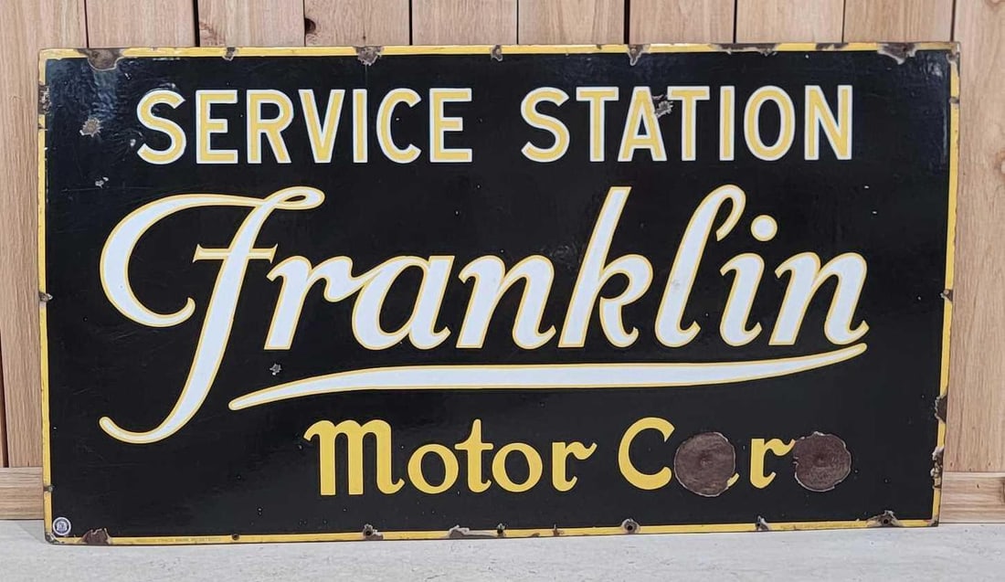 Franklin Motor Car Service Station Porcelain Sign (TAC): rated 8.25, 26"x48", This SSP sign has good color and gloss, with a few small chips in the field. Sign has large chips in the lower field, as well as around the perimeter. Marked Baltimore