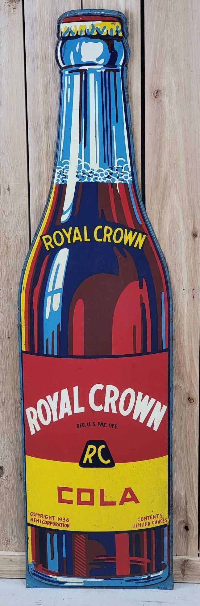 Royal Crown Cola Metal Bottle Sign (TAC): rated 7.75, 58.5"x15.5", the SST embossed bottle-shaped sign has good color, has paint roughness, paint is tight, dated 1936. Rarity 3.TAC #061141
