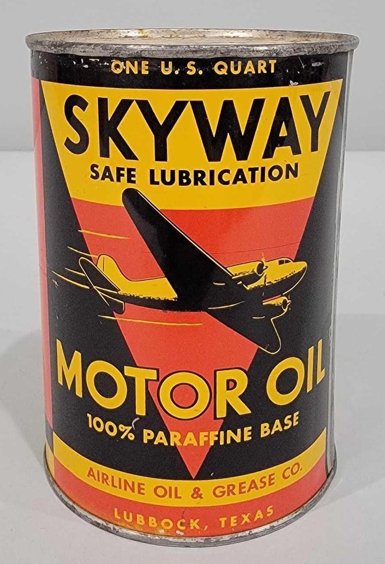 Skyway Motor Oil w/DC-3 Image One-Quart Round Metal Can: rated 8.9 & 6.5, the one quart round metal can with soldered seam, has good color and shine, display has light wear, reverse has large area of paint loss, is full. Rarity 7. TAC #060753