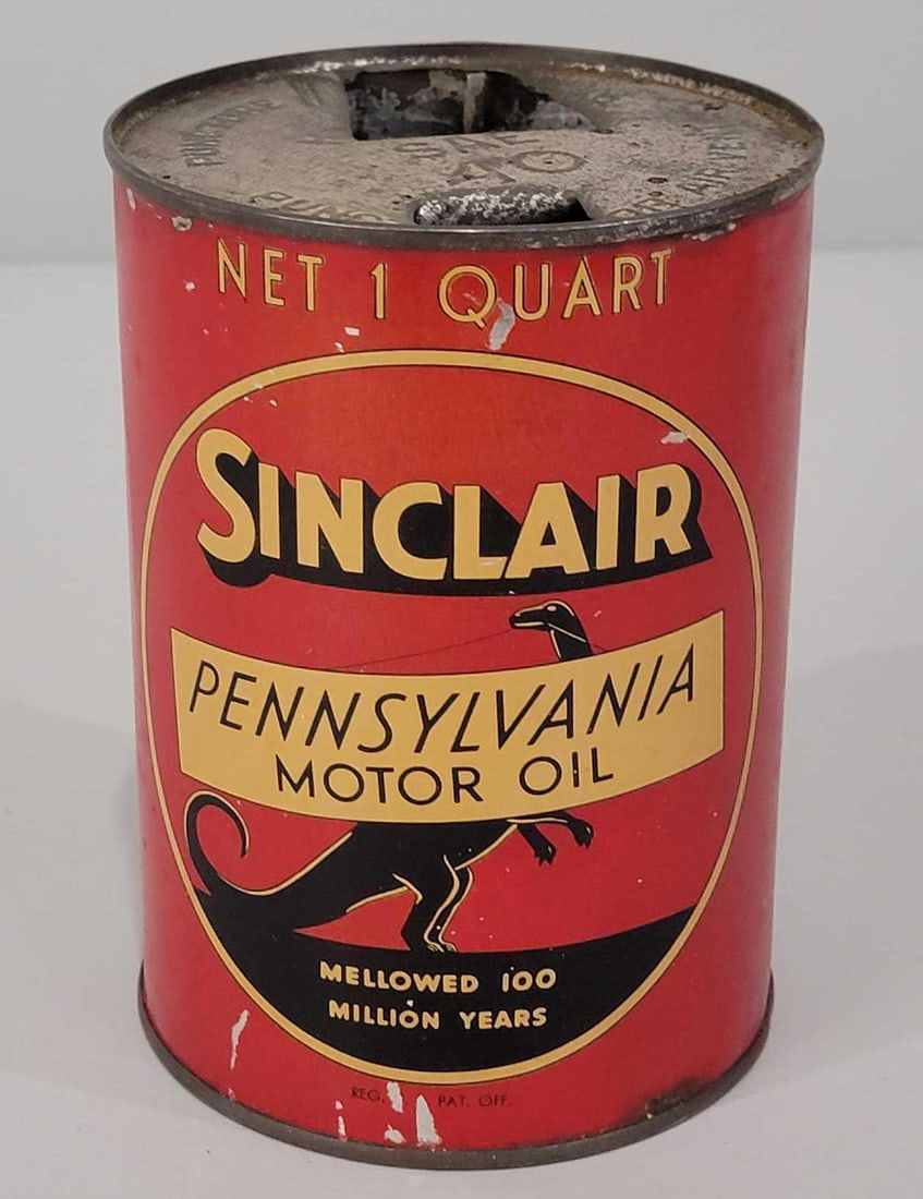 Sinclair Pennsylvania Motor Oil w/Standing Dinosaur Logo Quart Can (TAC): rated 8, the one quart round metal can with soldered seam, is empty, open on top, has some wear.