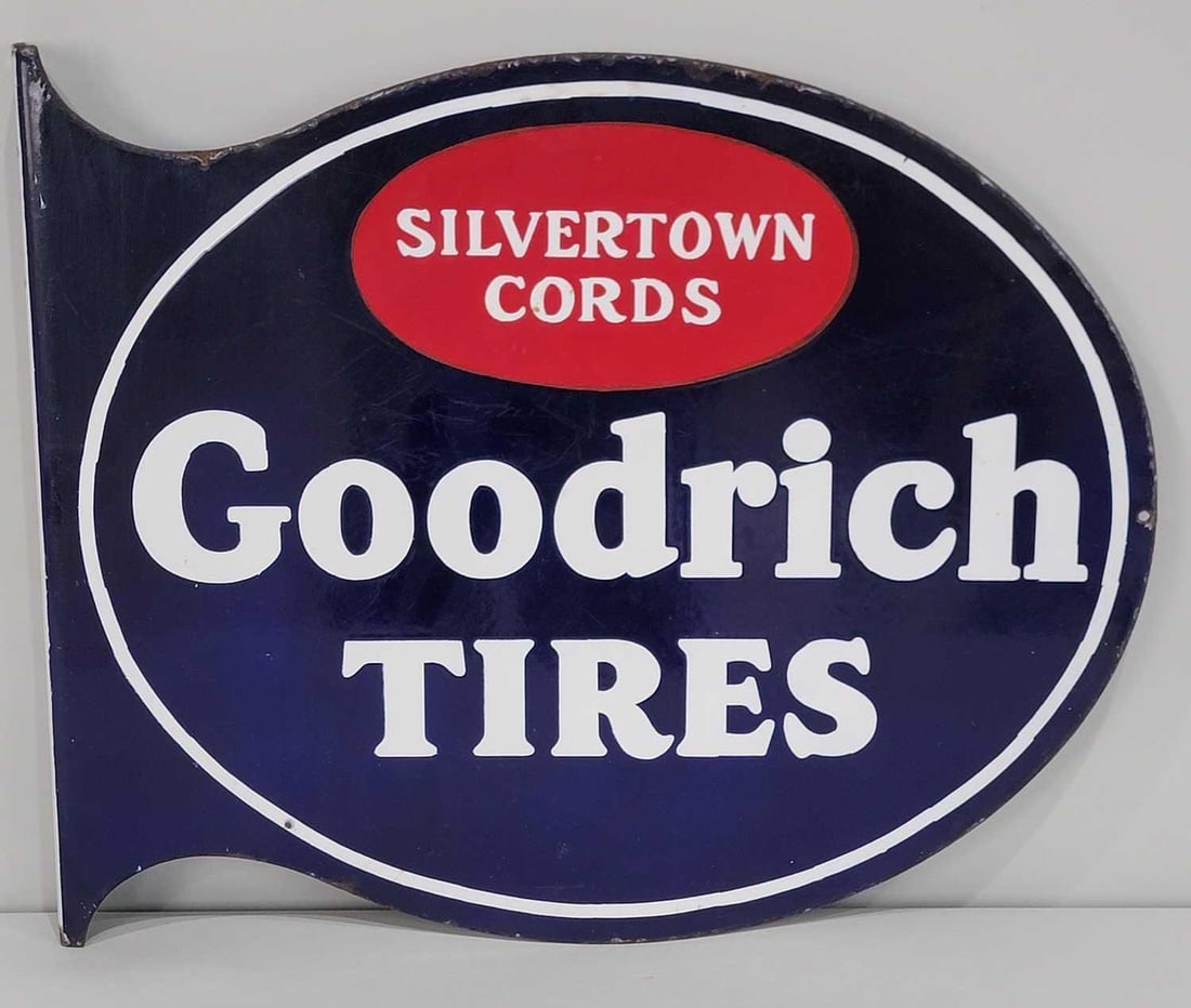 Goodrich Tires Silvertown Cords Porcelain Flange Sign (TAC): rated 8.75, 19"x23", the diecut flange sign has good color and gloss, has wear and marks in the field. Rarity 4. TAC #061003