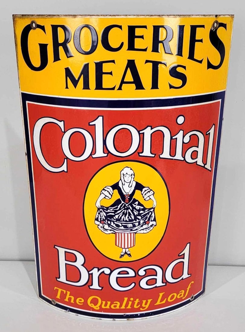 Colonial Bread w/Logo Groceries Meats Curved Porcelain Sign (TAC): rated 9, 28"x20", the SSP curved sign has very good color and gloss, the field is clean except the white has very light rust staining, small chips around the perimeter. Rarity 9. TAC #060975