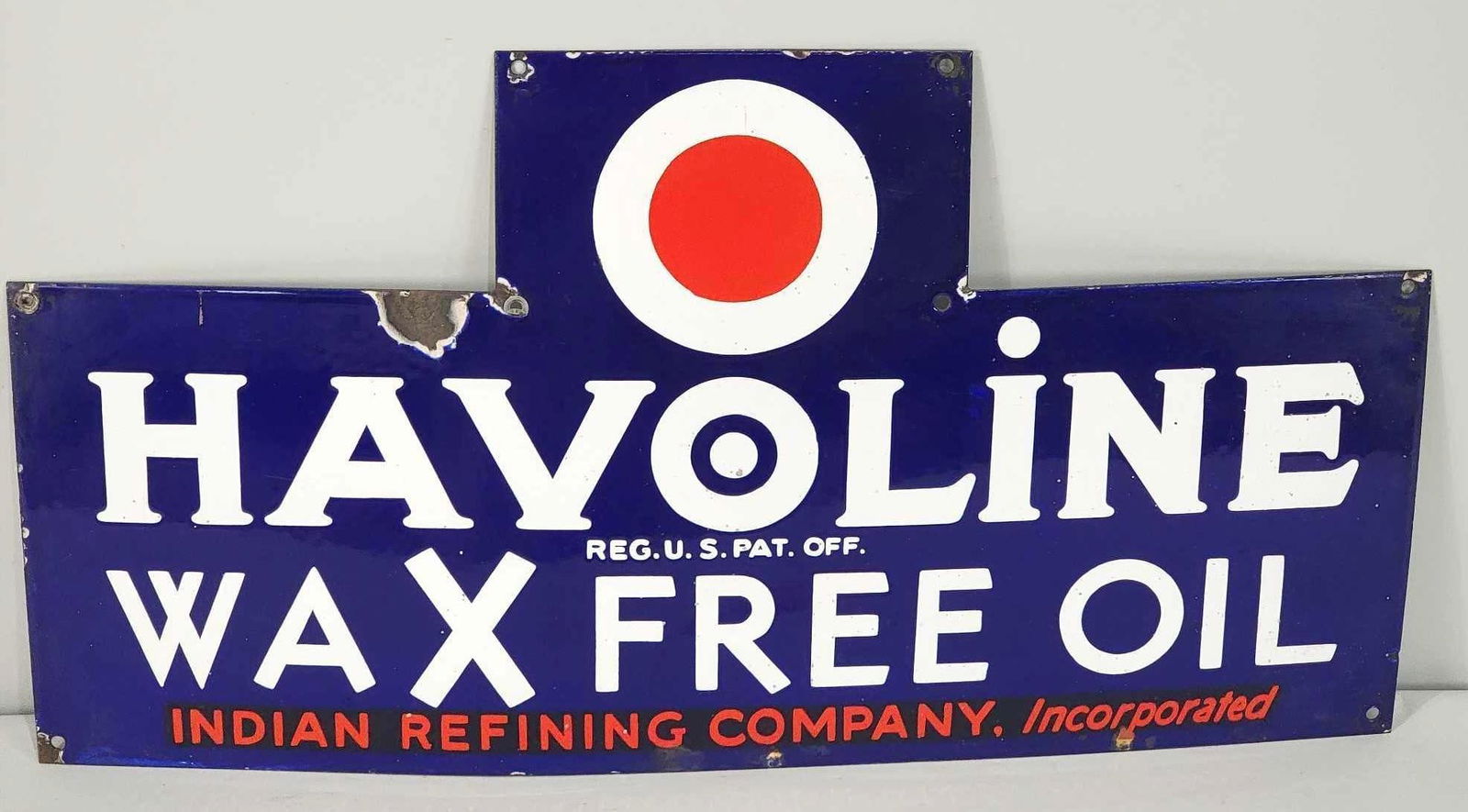 Havoline Wax Free Oil w/Red Dot Logo Porcelain Sign: rated 8.5, 15.75"x29.5", the SSP die-cut sign has very good color and gloss, field is clean, has chips around the perimeter. Rarity 4. TAC #061151