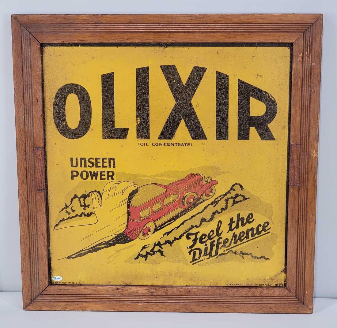 Olixir "Unseen Power Feel the Difference" w/Sedan Image Metal Sign (TAC): rated 7, 18"x18", the SST sign has soiling and paint crazing, has been framed. Rarity 6. TAC #033821