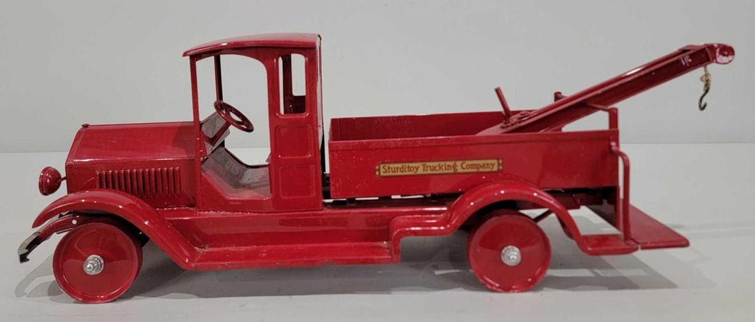 Sturditoy Trucking Co. Press Steel Wrecker (restored): 26.5"L., the press steel truck has been professionally restored, needs tires, comes with none.