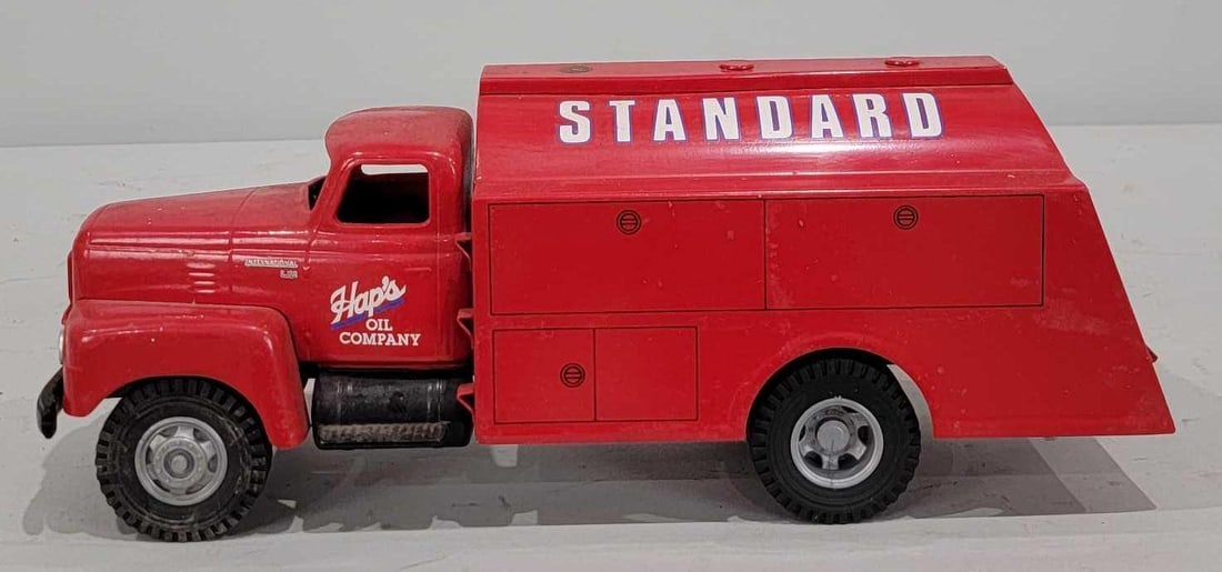 Cottonwood Acres Hap's Oil Company Standard Delivery Truck: rated 8, 17"L., the truck has some wear, paint chips and missing parts.