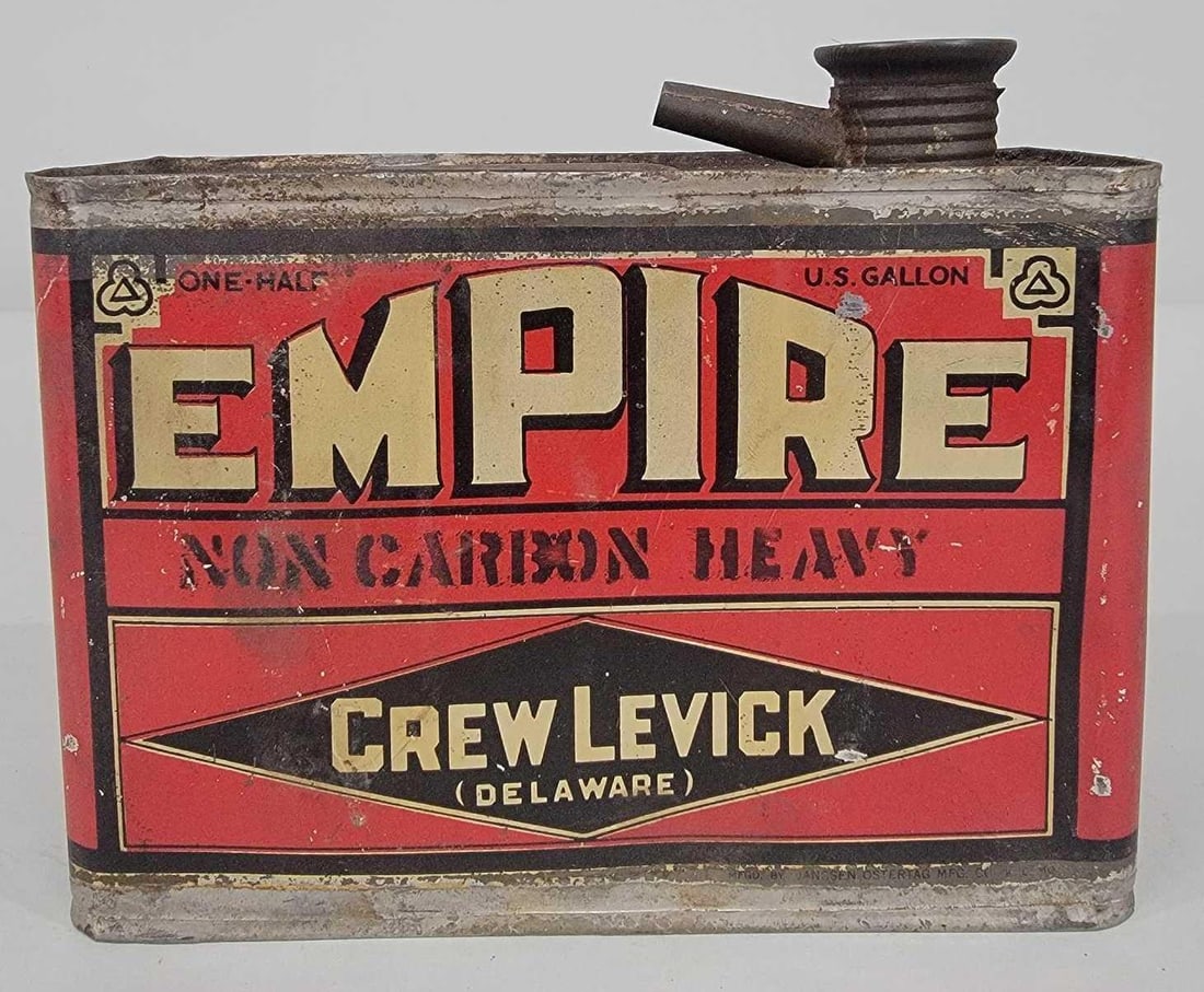 Empire Crew Levick Motor Oil Half-Gallon Flat Metal Can: rated 7.5, the half-gallon flat metal can has good color, has wear, fine scratches and dings, is empty, has lid and spout.
