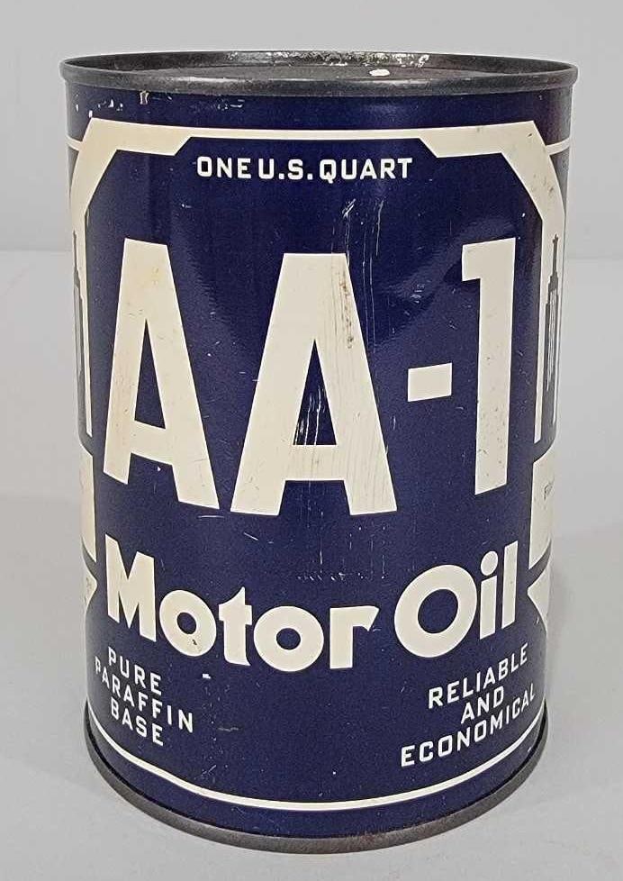 AA-1 Motor Oil One Quart Round Metal Can (TAC): rated 8.25, the one quart round metal can has good color and shine, soldered seam, has light wear and a few fine vertical scratches, is empty, opened on top. TAC #061298