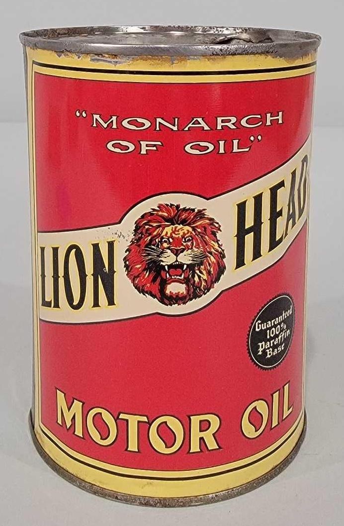 Gilmore Lion Head "Monarch of Oil" One-Quart Round Metal Can (TAC): rated 9, the one quart round metal can has excellent color and shine, is empty, opened on top, soldered seam, display is nice, reverse has small dent, edge wear. TAC #061304