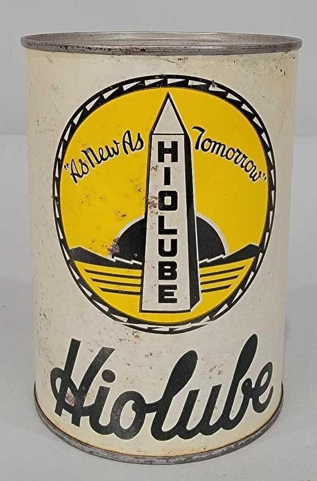 Hiolube Motor Oil One Quart Round Metal Can (TAC): rated 7.5, the one quart round metal can, has crimped seam, is empty, has new top, has wear and soiling. TAC #061310