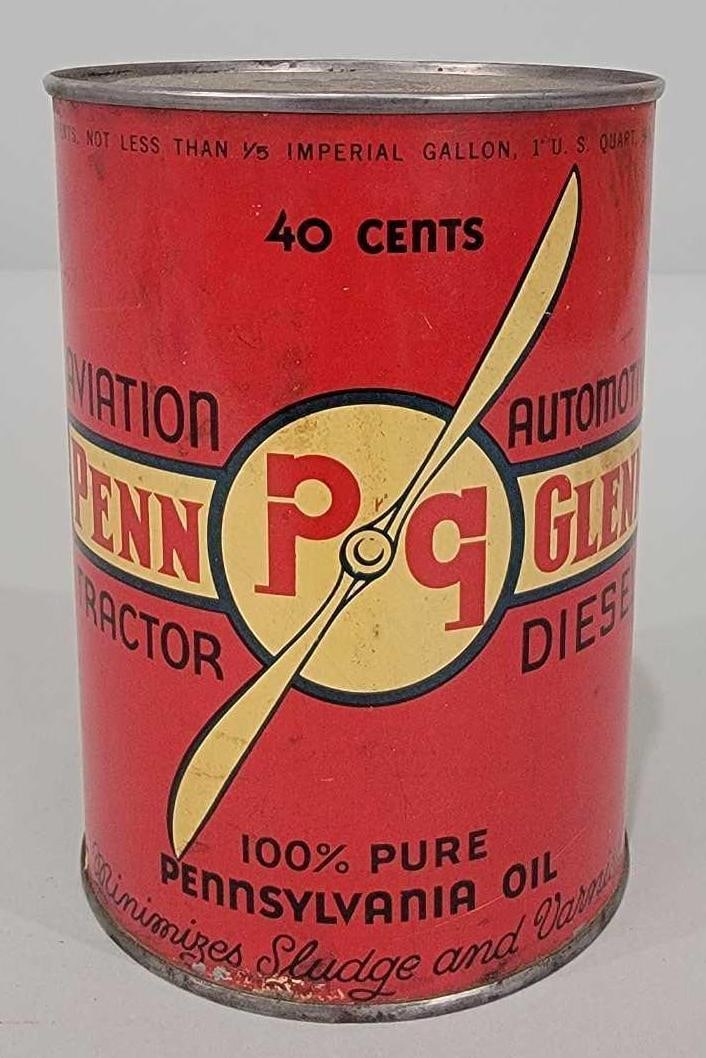 Penn Glenn Motor Oil One Quart Round Metal Can (TAC): rated 7.75, the one quart round metal can, soldered seam, empty, opened on bottom, has light wear and soiling. TAC #061312