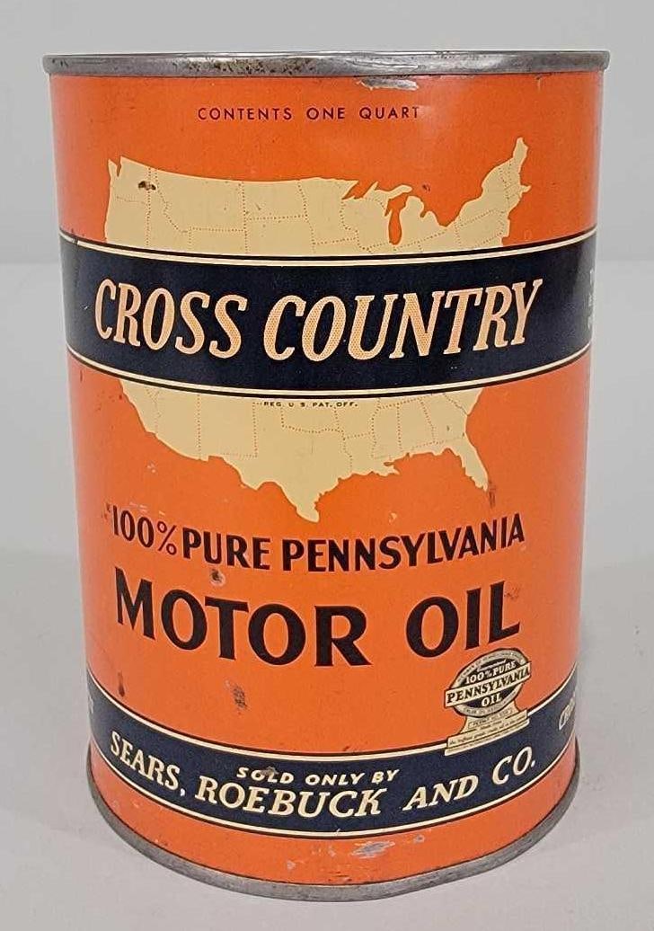 Cross Country Motor Oil One Quart Round Metal Can (TAC): rated 8, the one quart round metal can has good color and shine, has soldered seam, is empty, opened on top, has light wear and soiling.TAC #061318