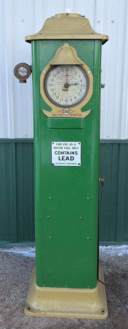 Erie Model #603 Clock Face Gas Pump (restored): 75"T., the gas pump has been restored green with tan trim, comes with spinner gauge. Has Keys and pumps inside. This Item must be picked up in Wisconsin