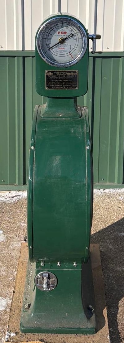 Service Station Eq. ECO Model 19 Air Meter on Hose Reel: 48"x12"x26", has been professionally restored in green, appears to be complete with no broken or repaired parts. This Item must be picked up in Wisconsin
