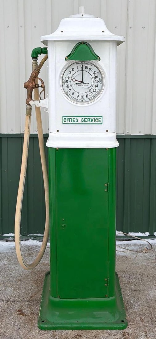 1930's Erie Model 753-LP Clock Face Gas Pump (restored): 76"T., has been professionally restored in Cities Service colors, comes with white hose and brass nozzle. The clock faces the paint is peeling badly. Pumps are removed. This Item must be picked up