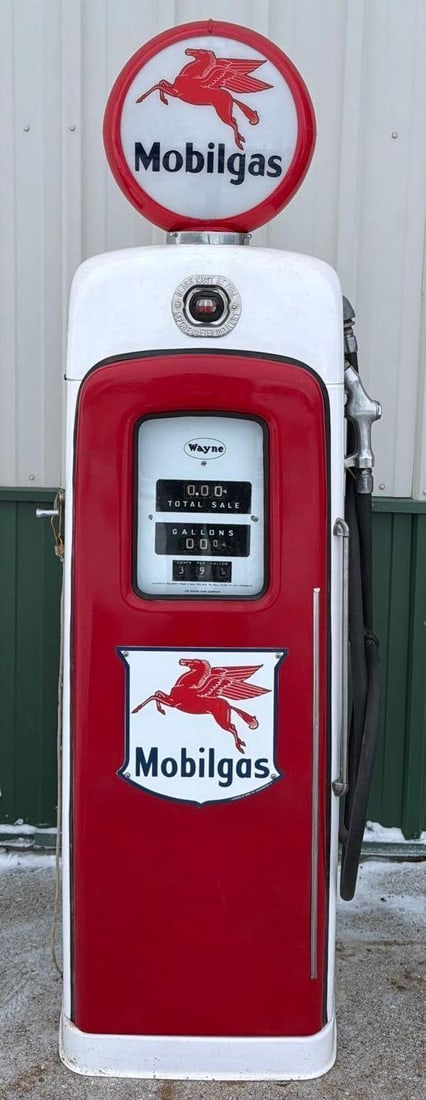 1951 Wayne Model #80 w/Sight Glass Top (repainted): 80"T. the gas pump has a older restoration, has wear, comes with hose and nozzle, also has a reproduction Mobil globe and pump plate. This Item must be picked up in Wisconsin