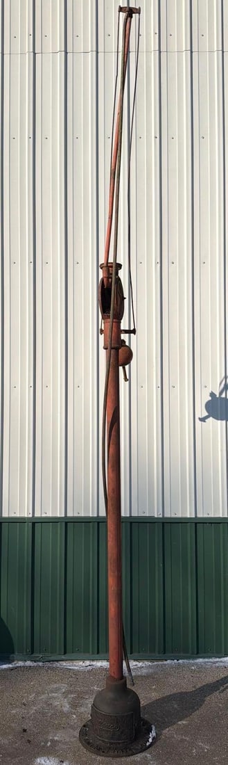 1929 USACO Cast Iron Embossed "AIR" Counter-Balanced Whip on Stand: 150"T., in original as found condition, has minor surface rust, does not appear to have any cracks or breaks. This Item must be picked up in Wisconsin