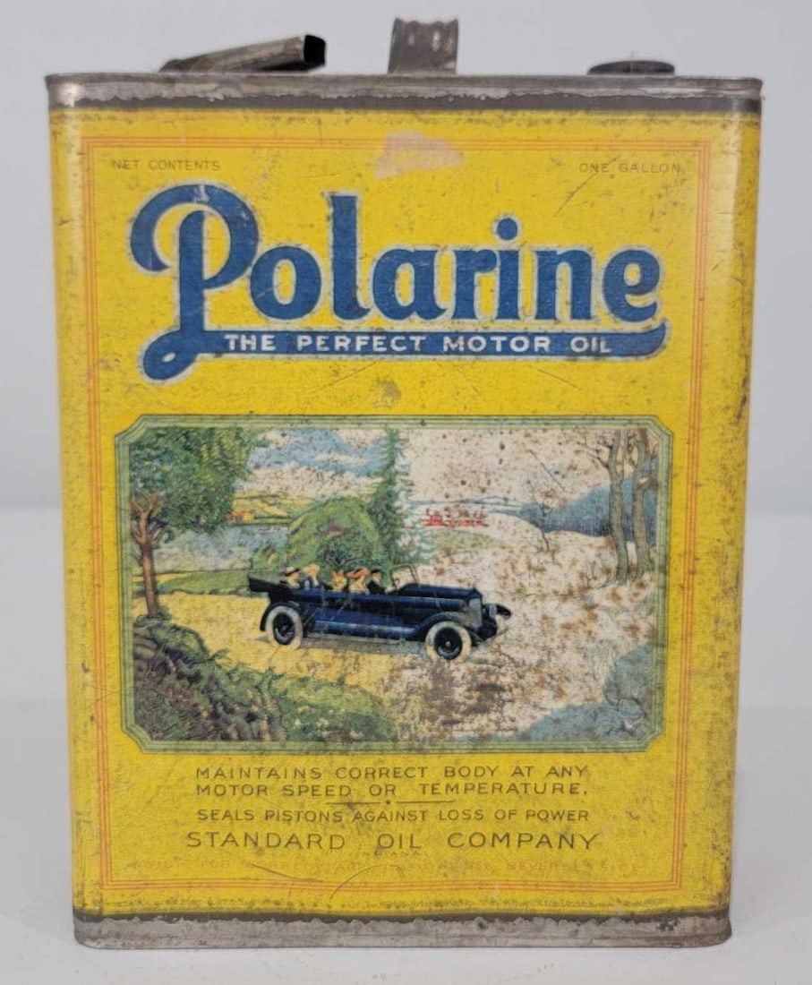 Standard Oil Polarine w/Image One-Gallon Flat Metal Can: rated 6.75, the one-gallon flat metal can has rust and wear, is empty, has lid and spout.