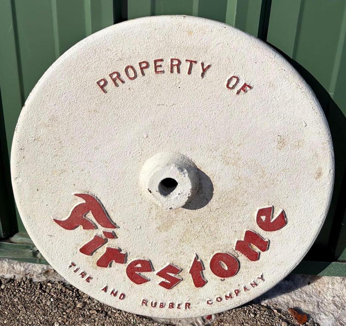 Cast Iron Embossed Firestone (tire) Cast Iron Curb Stand Base: in good condition. This Item must be picked up in Wisconsin