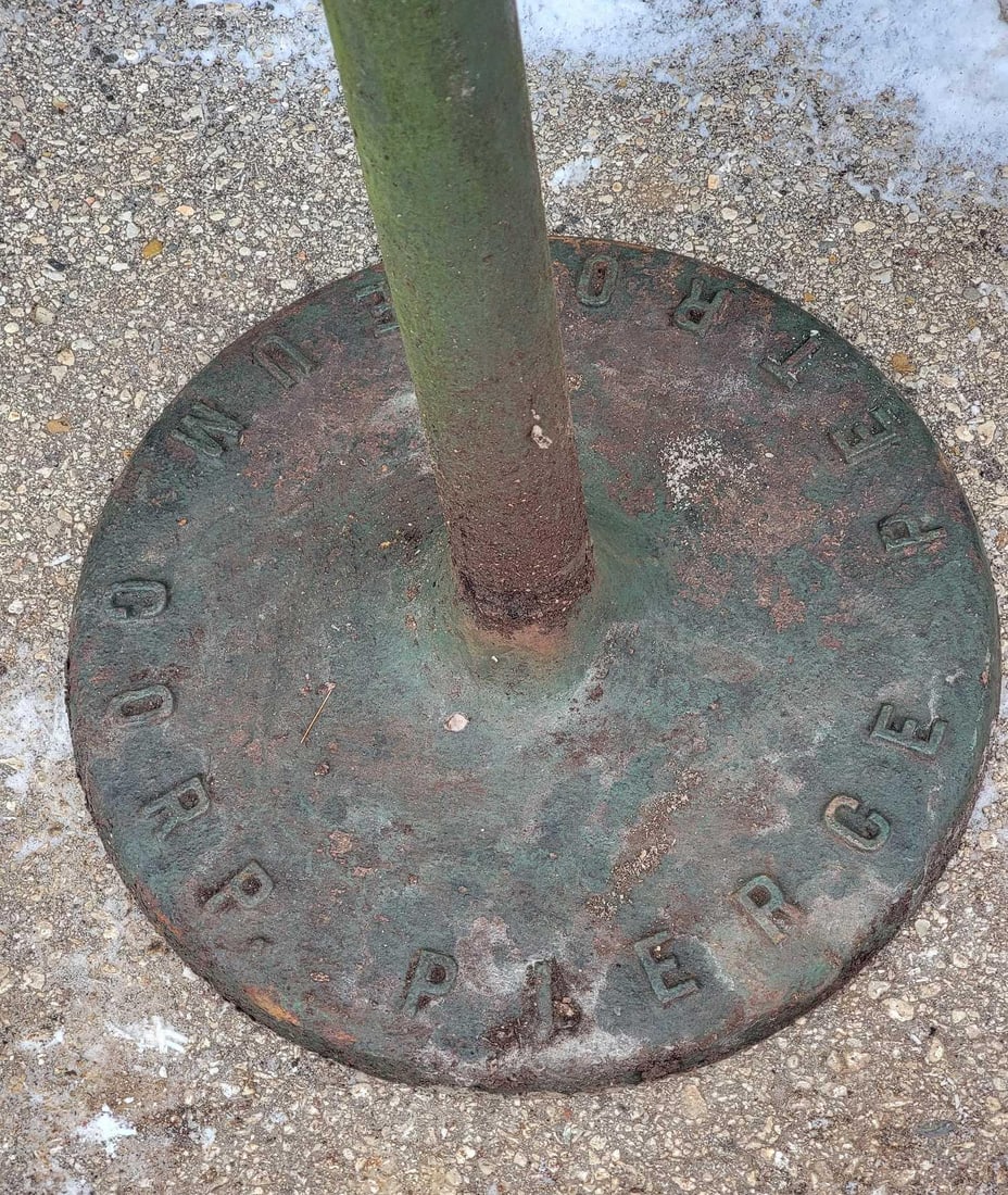 Pierce Petroleum Corp. Cast Iron Base: Base is 18"D., 54"T., don't not if pipe will unscrew. This Item must be picked up in Wisconsin