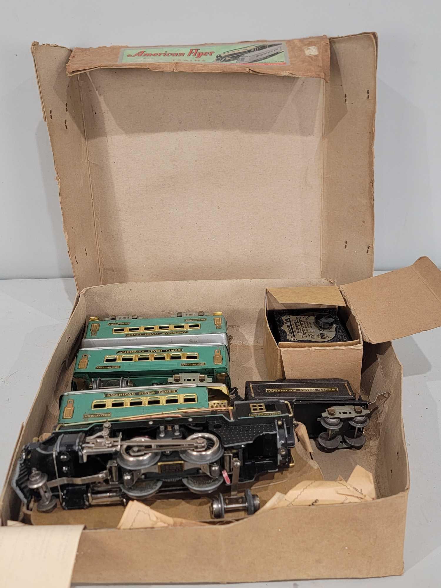 American Flyer Trains Set #7486: set comes with Engine 2-4-2, coal tender, 3-passenger cars and transformer, box is in poor condition.