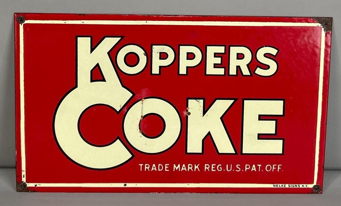 Koppers Coke Single-Sided Porcelain Sign: (Rated 8.5). 10" x 17". This SSP sign has porcelain loss and staining in the field. Outer edge shows minor staining and porcelain loss. Marked, "Nelke Signs". Rarity 5. TAC # 062284