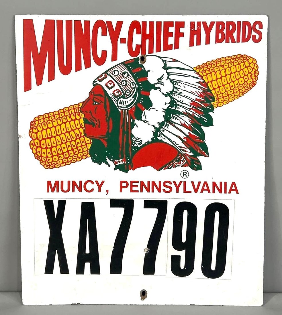 Muncy Chief Hybrids Masonite Sign W/ Native American Graphic: (Rated 8.9). 16" x 19". This single-sided masonite sign has excellent color throughout. Sign has minor blemish on the outer field, as well as, wear at the mounting holes. Rarity 2. TAC # 062313 