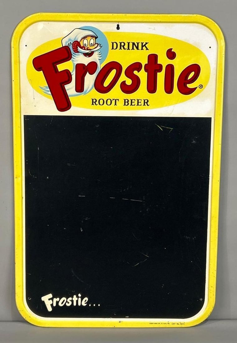 Frostie Root Beer Menu Board W/ Mr. Frostie Graphic: (Rated 8.9) 19.5" x 30". This SST menu board has good color and gloss throughout. Sign shows minor surface scratching in the field and on the outer edge. Marked, "Stout Sign Co." Rarity 2. TAC #