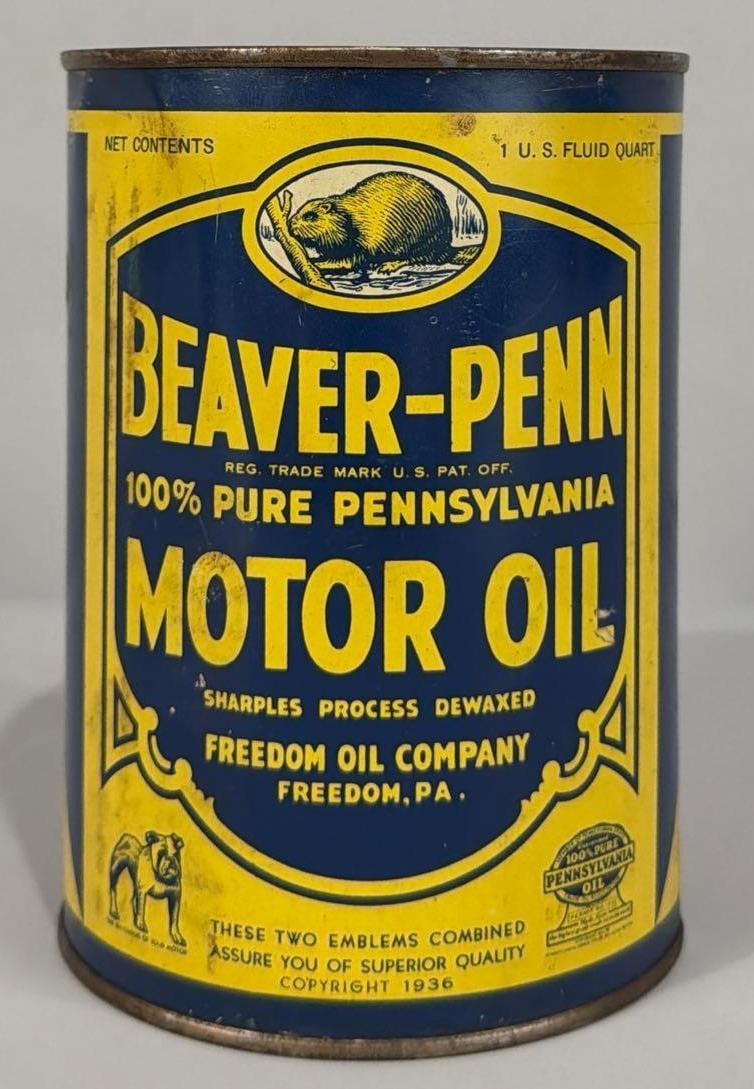 Beave-Penn Motor Oil Quart Round Metal Can (TAC): rated 8, the one quart round metal can has soldered seam, is full, has wear and dent on the side at top rim. TAC #062009
