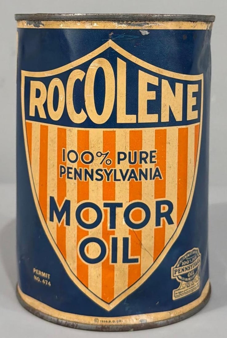 Rocolene Motor Oil Quart Metal Can: rated 6, the one quart round metal can, soldered seam, top is missing , has dings and dents.