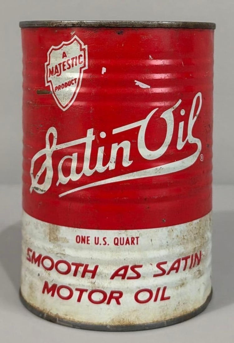 Satin Oil Motor Oil Quart Metal Can: rated 8.25, the one quart round metal can crimped seam, full, light soiling on front, paint loss on back.