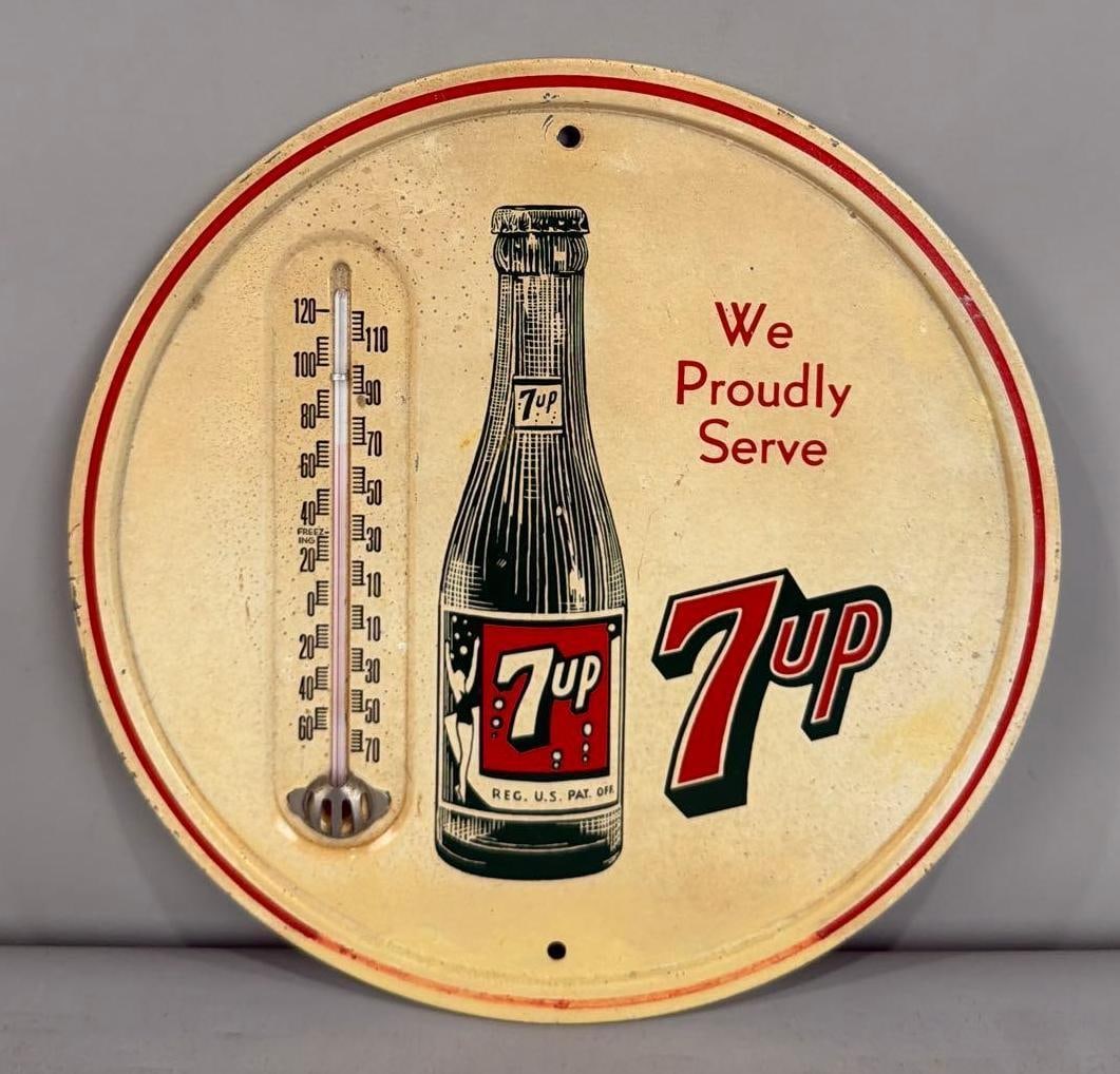 We Proudly Serve Seven Up Thermometer W/ Bottle Graphic: Rated 7.25. 9" dia. This SST thermometer has notable browning throughout, with a spot of touch up on the bottom hanging hole. Rarity 3. TAC# 061942.