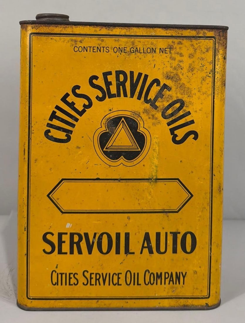 Cities Service Oils "Servoil Auto" One Gallon Metal Can: rated 7, the one gallon flat metal can, is empty, missing it's lid, has wear and scatches.