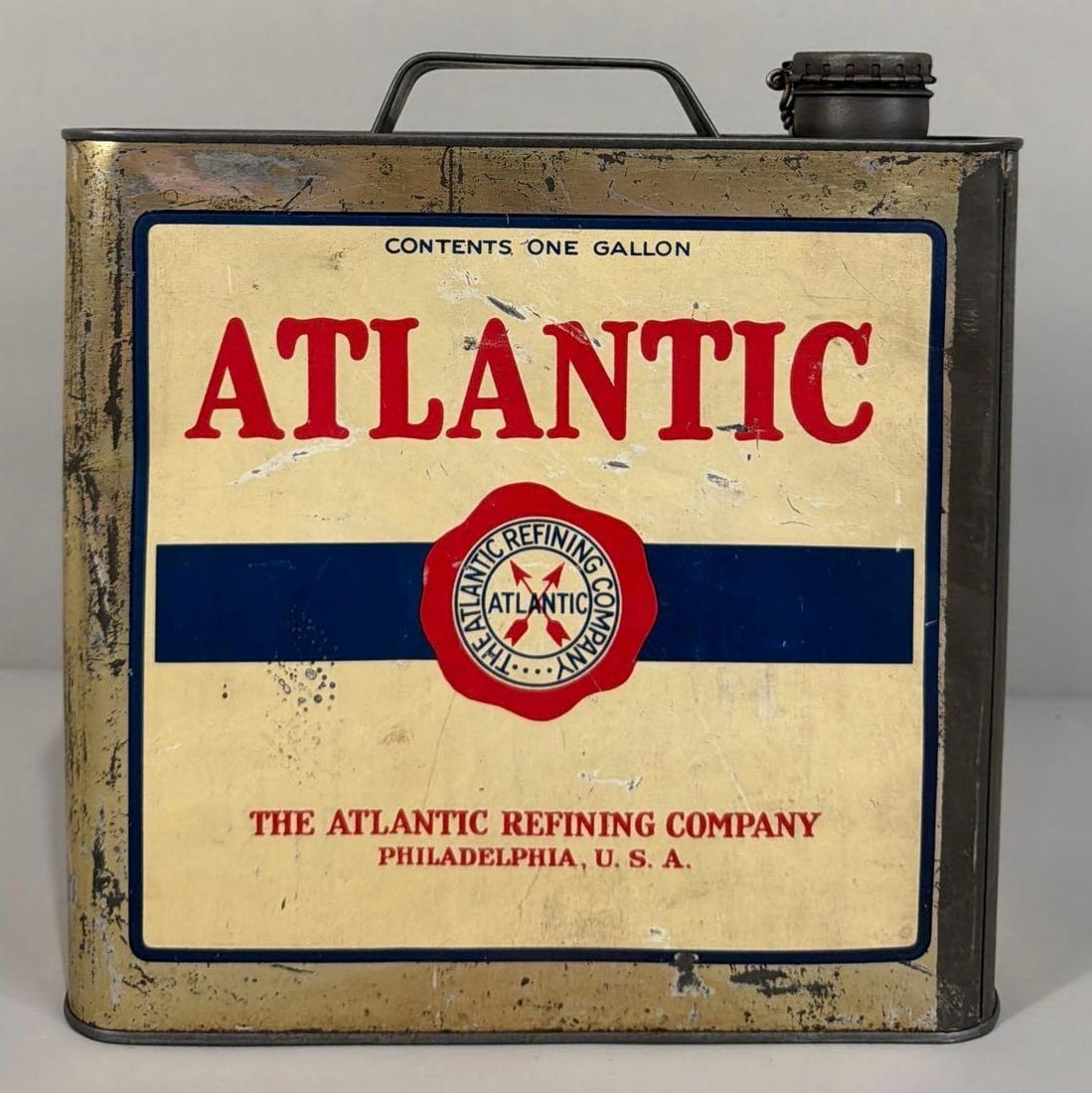 Atlantic Refining Co. Motor Oil One Gallon Flat Metal Can: rated 8, the one gallon flat metal can, is empty, has light soiling.