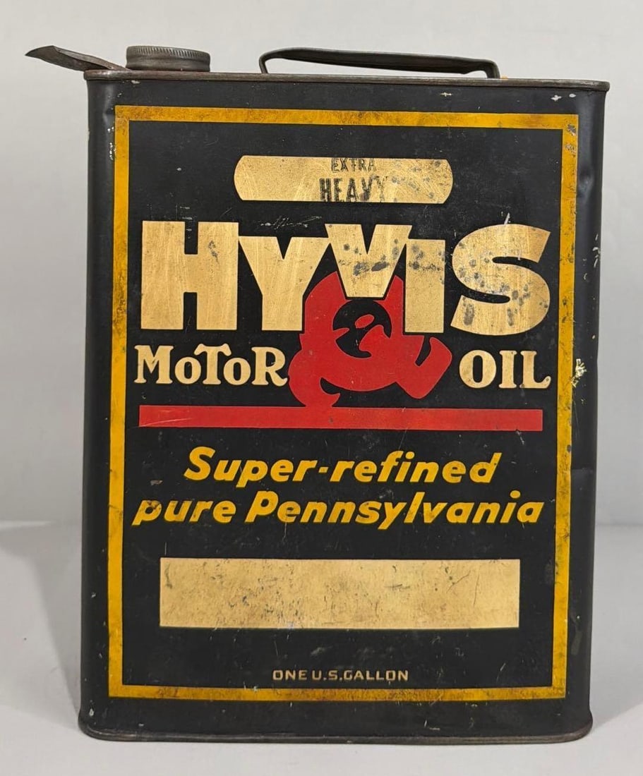 HyVis Motor Oil One Gallon Can: rated 7 & 6, the one gallon flat metal can, is empty, has wear and soiling, reverse has more.