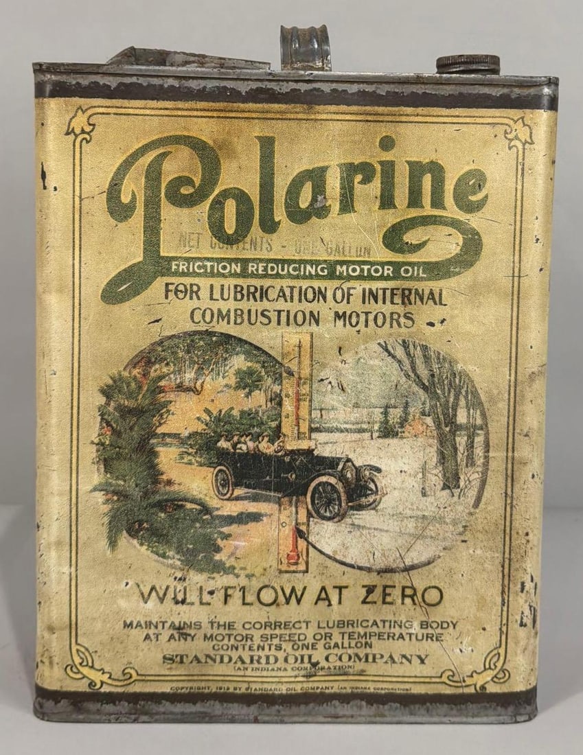 Polarine Motor Oil w/Car One Gallon Can: rated 6.9, the one gallon flat metal can, is empty, has wear and scratches.