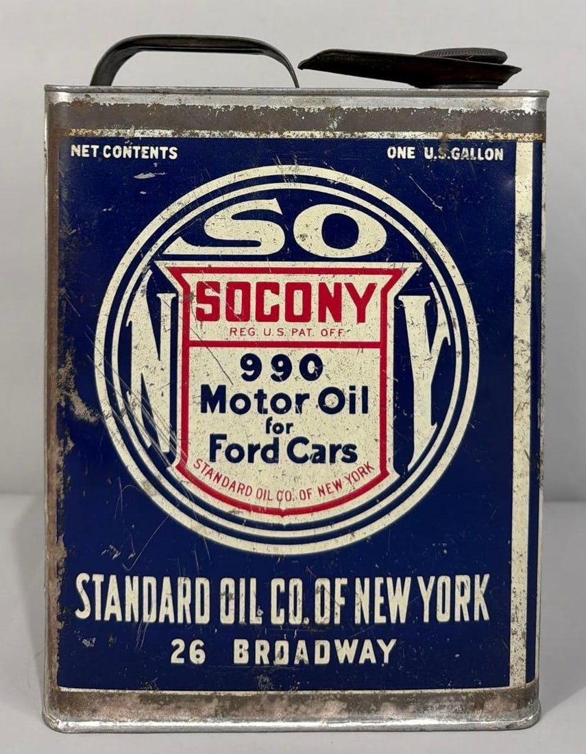 Socony 990 Motor for Ford Cars One Gallon Metal Can: rated 7.5 & 7, the one gallon flat metal can, is empty, has wear and fine scratches, reverse has more.