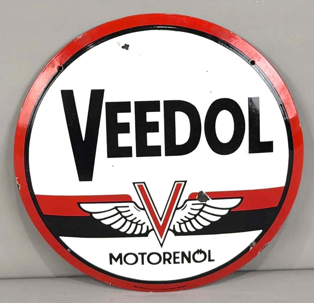 Veedol Motor Oil w/Logo Porcelain Sign (TAC): 8.5, 19.5"D. , the SSP domed sign has good color and gloss, has a few chips in the field, is marked and has a paper label. TAC #060523