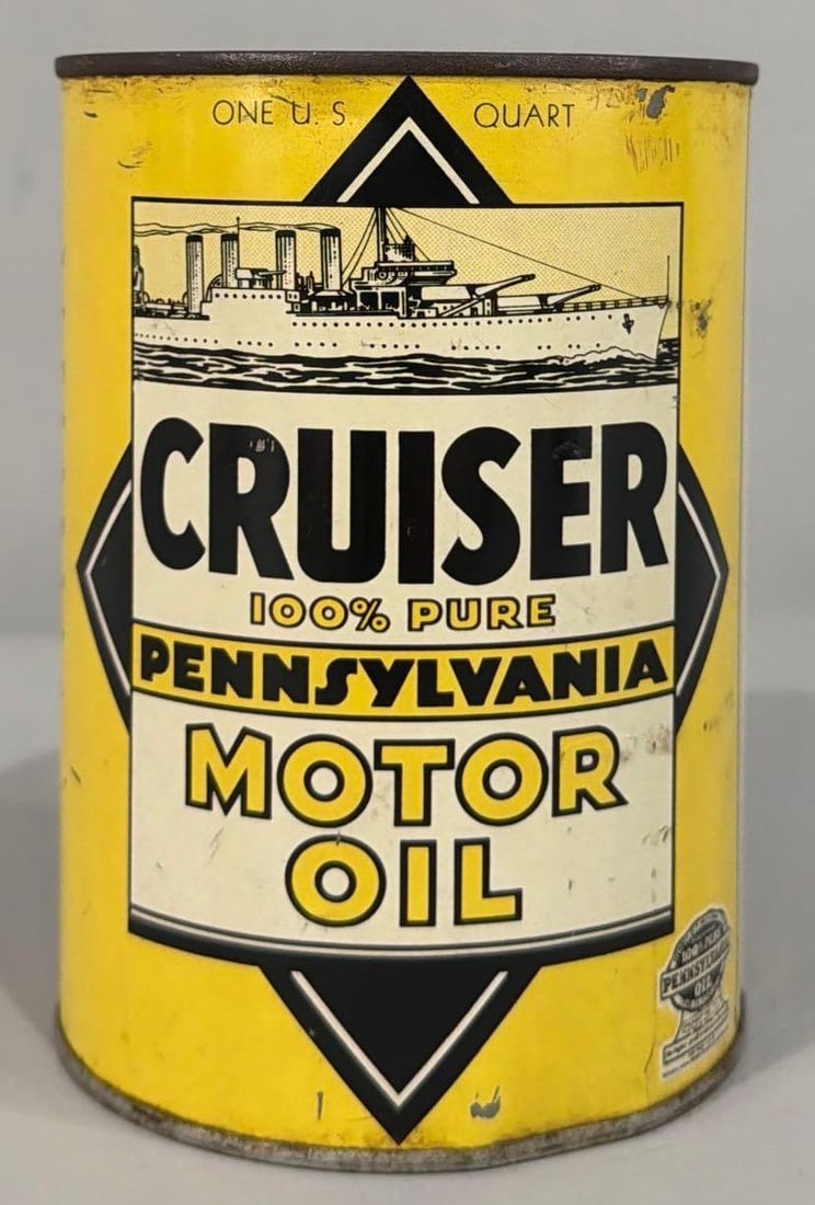 Cruiser Motor Oil w/Image Quart Metal Can: rated 8.25, the one quart round metal can, crimped seam, is full, has good color and shine, has wear.
