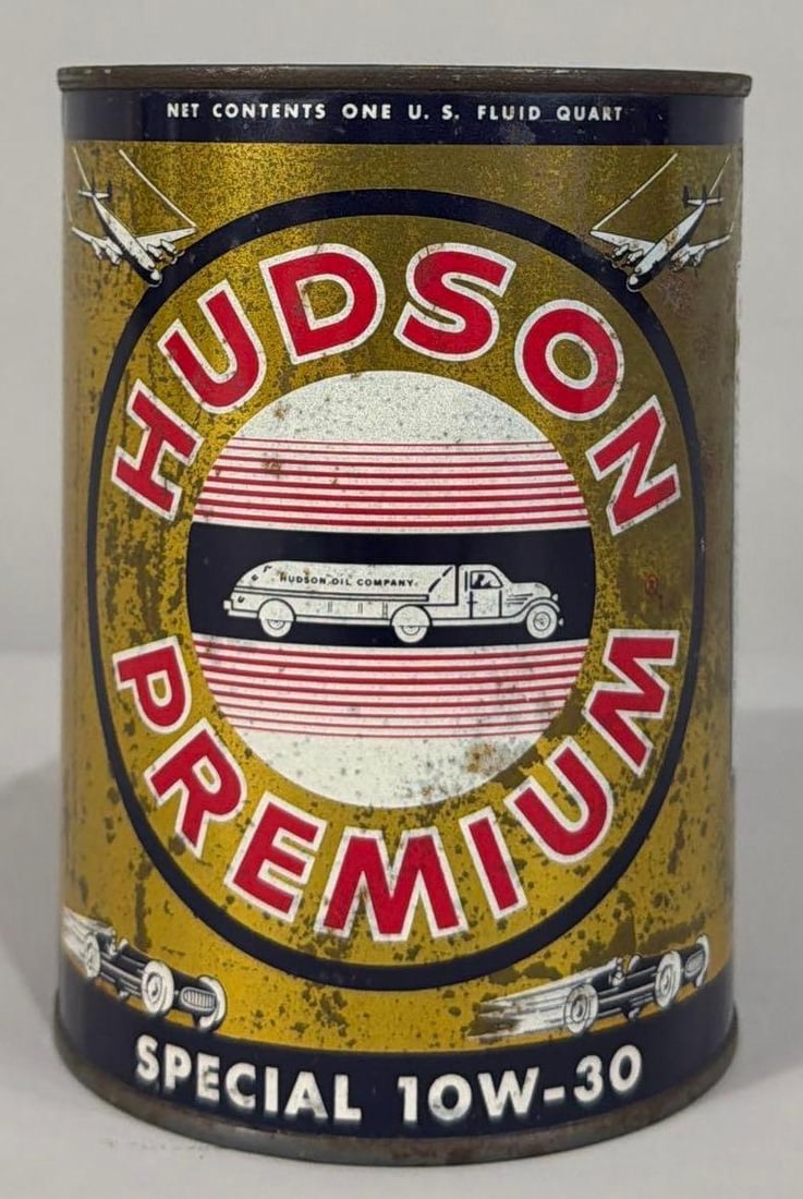 Hudson Premium Motor Oil Quart Metal Can: rated 7, the one quart round metal can, crimped seam, is full, has soiling and spots.