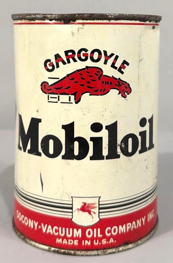 Mobiloil w/Gargoyle Motor Oil Quart Metal Can: rated 7.9, the one quart round metal can, soldered seam, is empty, has wear on face.