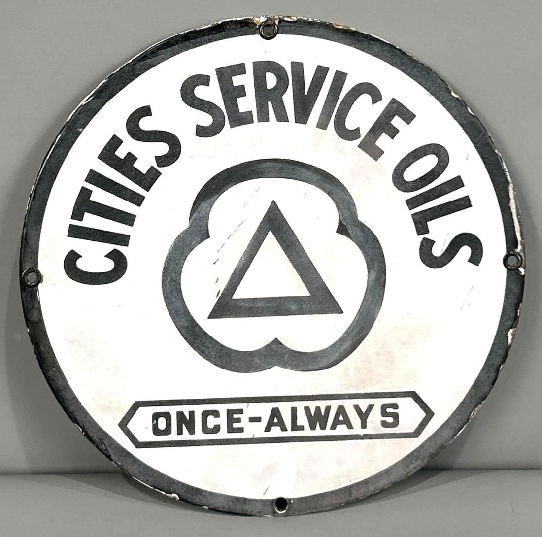 Cities Service Oils Single-Sided Porcelain Plate Sign: (Rated 7.0). 10.25" dia. This SSP sign has notable fade throughout. Sign shows other areas of staining and porcelain loss on the edge. Rarity 2. TAC # 034000